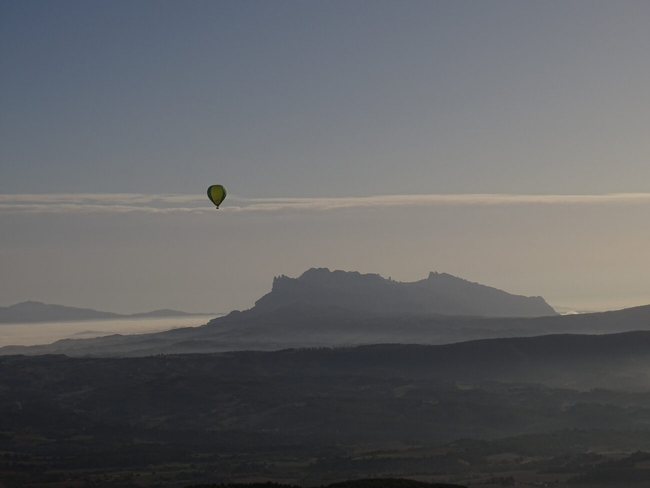 hot air balloon flight in El Bages with the Montserrat skyline
