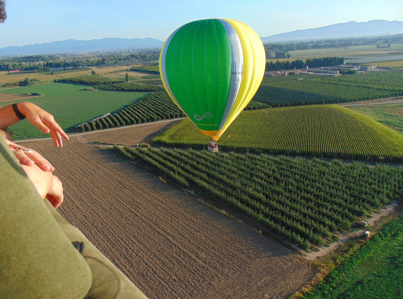 hot air balloon over an open landscape of western Catalonia